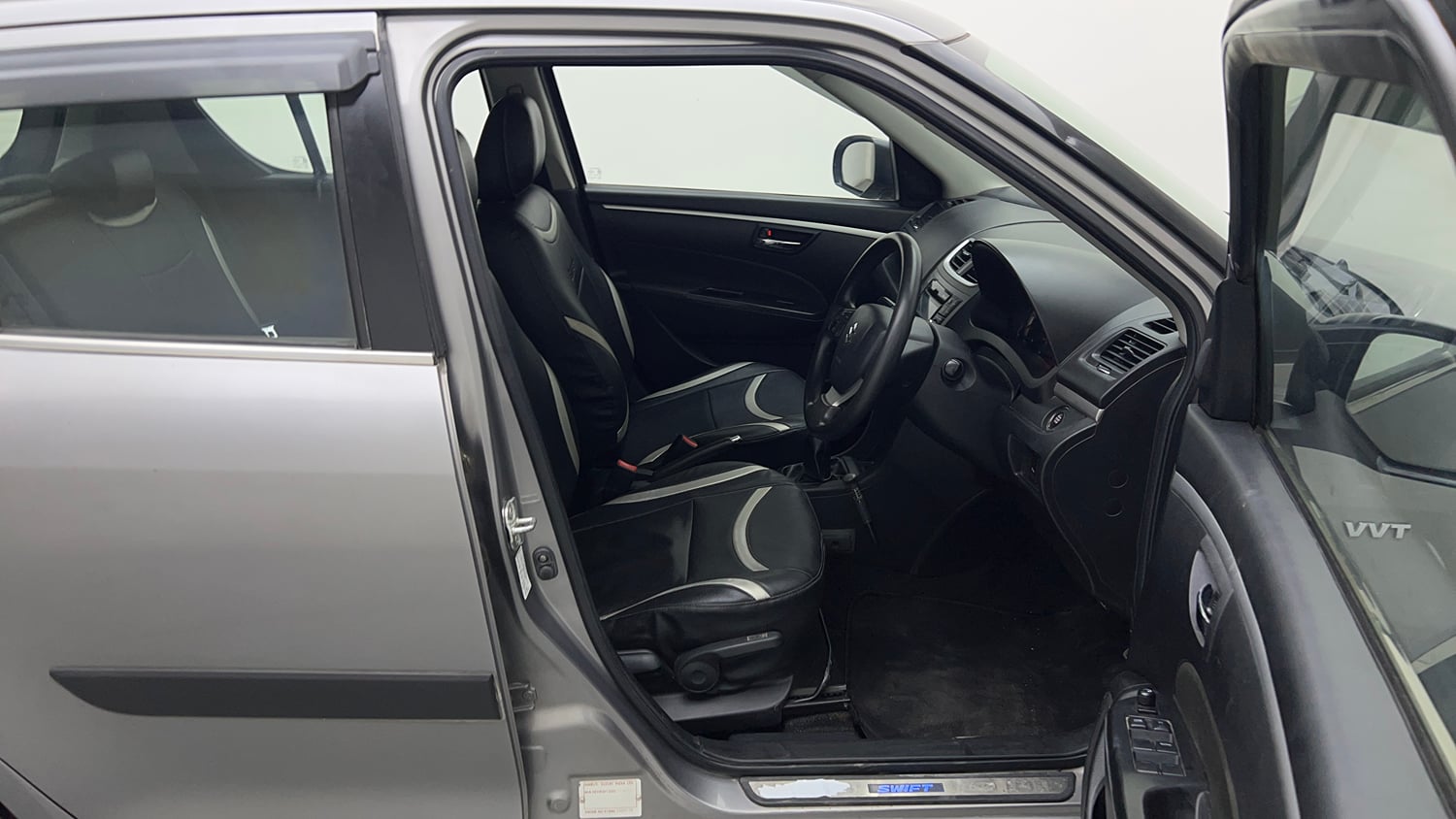 Used 2015 Maruti Suzuki Swift ZXi Petrol Manual interior RIGHT SIDE FRONT DOOR CABIN VIEW