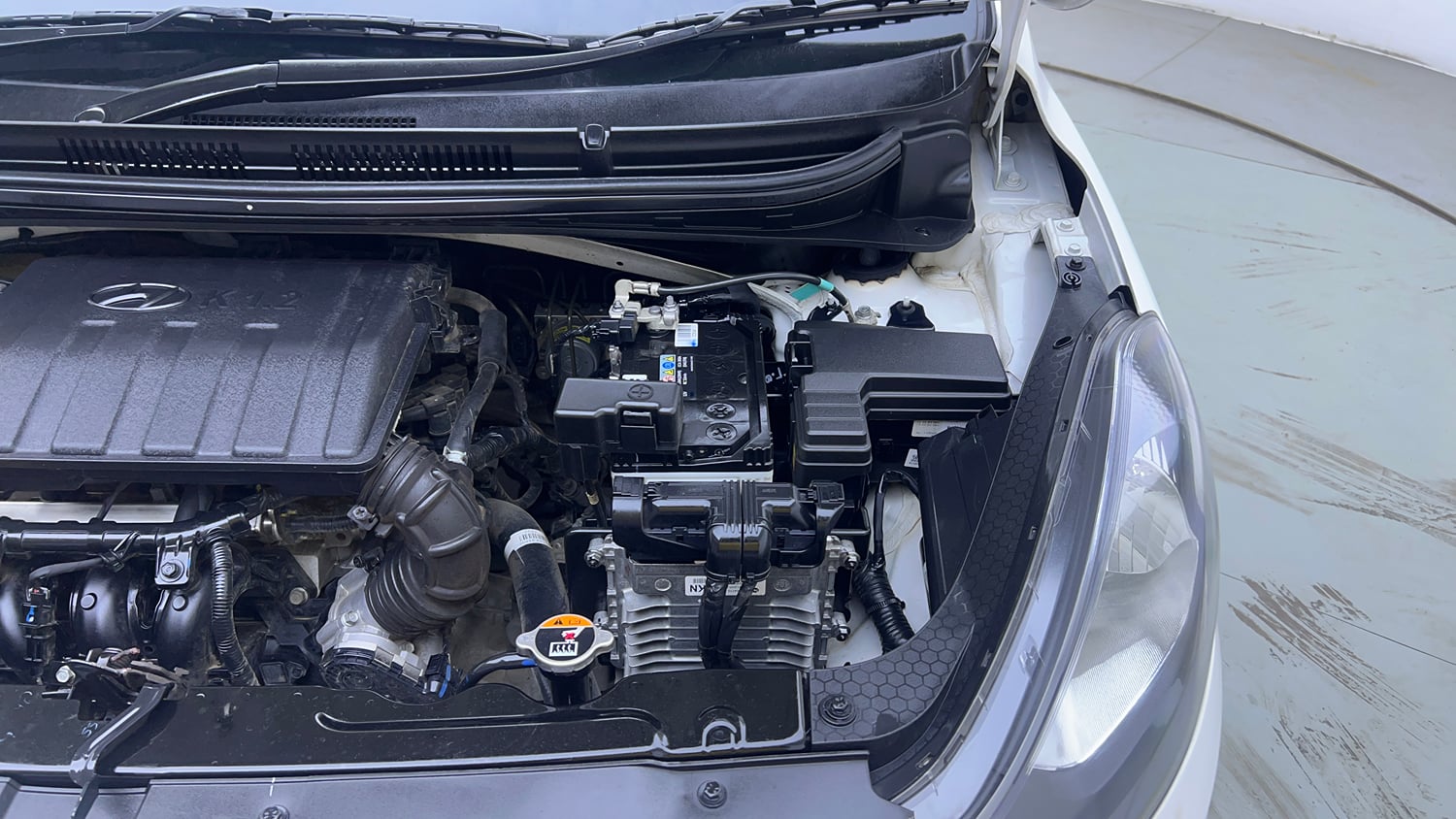 Used 2022 Hyundai Grand i10 Nios Magna AMT 1.2 Kappa VTVT Petrol Automatic engine ENGINE LEFT SIDE VIEW