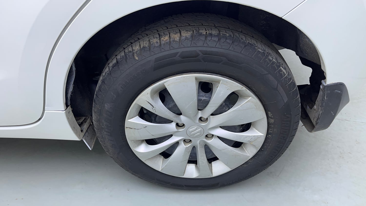 Used 2016 Maruti Suzuki Baleno Delta 1.2 Petrol Manual tyres LEFT REAR TYRE RIM VIEW