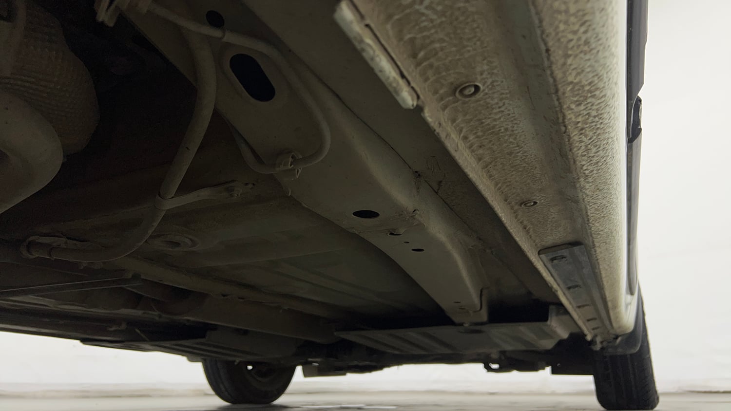 Used 2021 Maruti Suzuki Dzire VXi Petrol Manual extra REAR RIGHT UNDERBODY VIEW