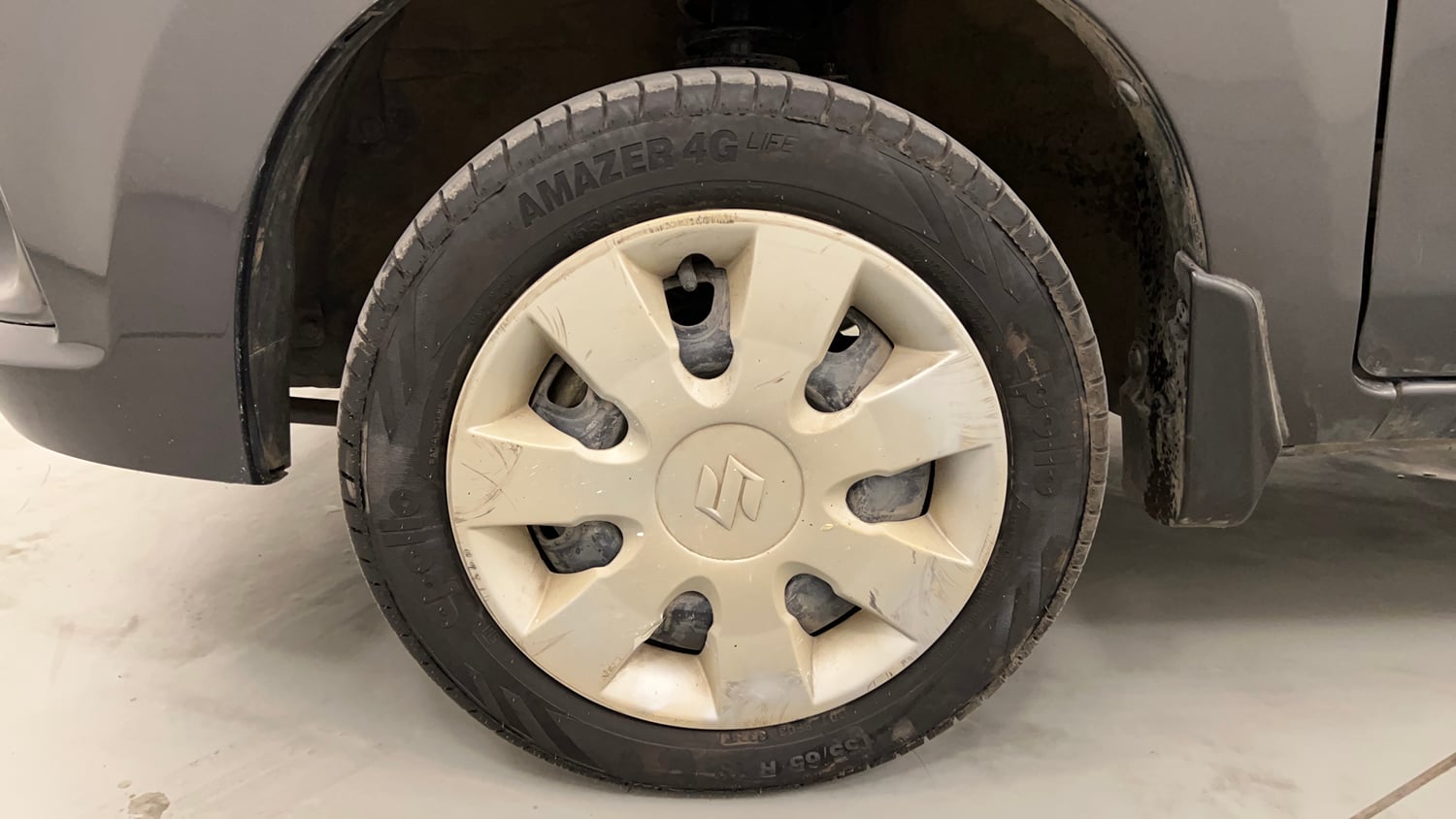 Used 2015 Maruti Suzuki Alto K10 VXi Petrol Manual tyres LEFT FRONT TYRE RIM VIEW
