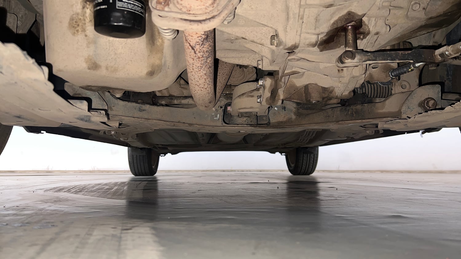 Used 2018 Maruti Suzuki Baleno Zeta 1.2 Petrol Manual extra FRONT LEFT UNDERBODY VIEW
