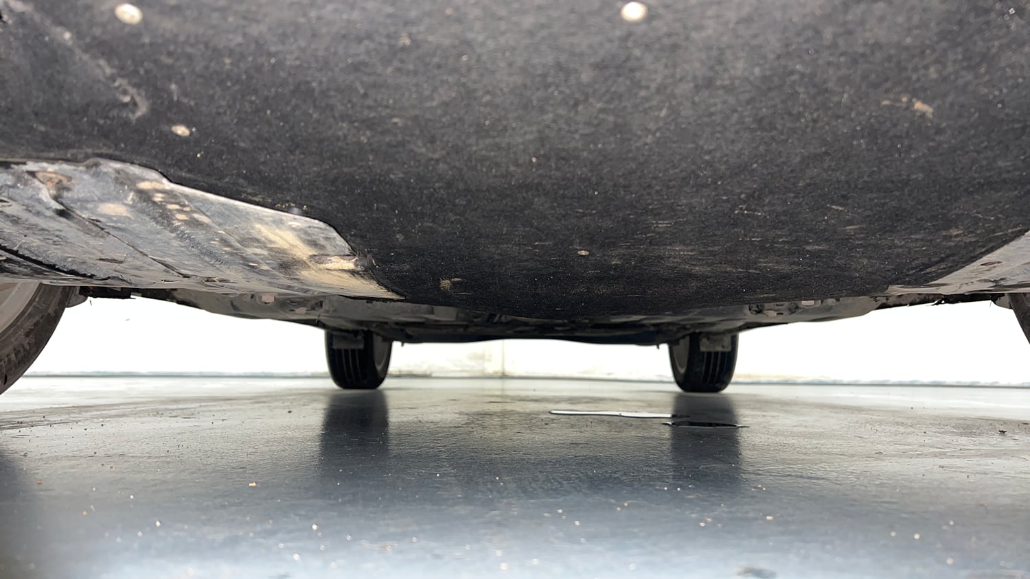 Used 2024 Maruti Suzuki Baleno Zeta MT Petrol Manual extra FRONT LEFT UNDERBODY VIEW