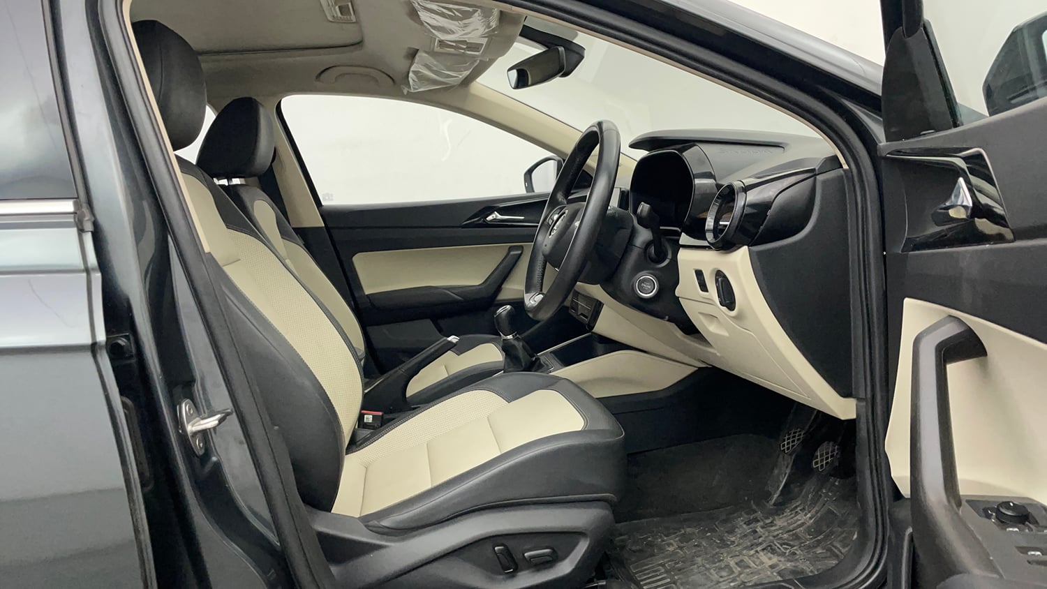 Used 2024 Skoda Slavia Style 1.0L TSI MT Petrol Manual interior RIGHT SIDE FRONT DOOR CABIN VIEW
