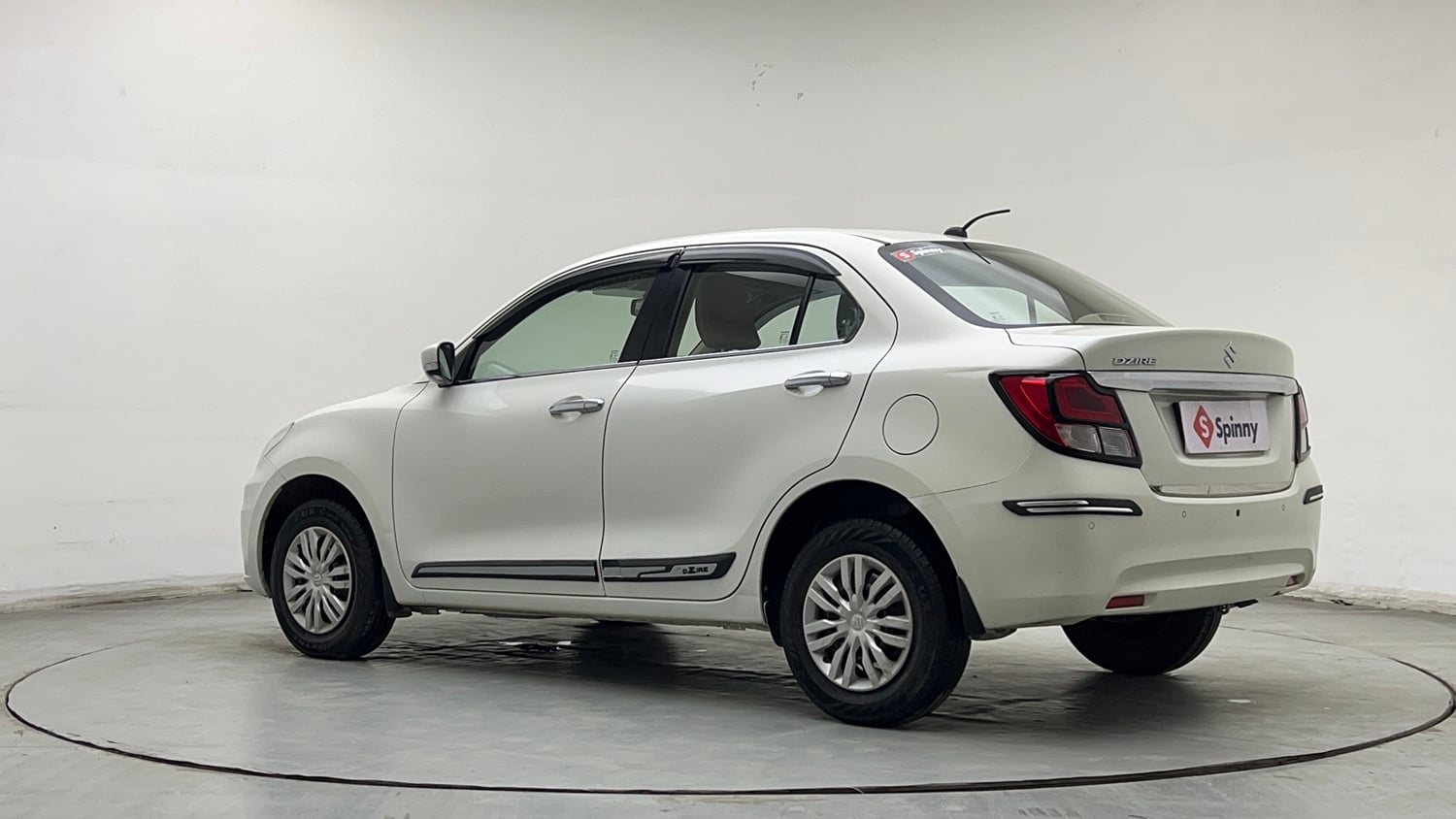 Used 2021 Maruti Suzuki Dzire VXi Petrol Manual exterior LEFT REAR CORNER VIEW