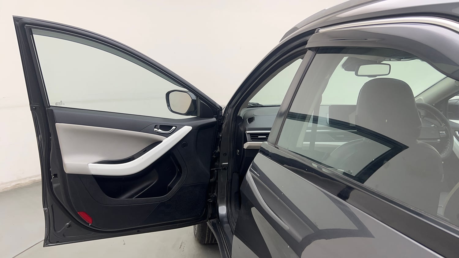 Used 2024 Tata Nexon Creative Plus S 1.2 Revotron Petrol 6AMT Petrol Automatic interior LEFT FRONT DOOR OPEN VIEW