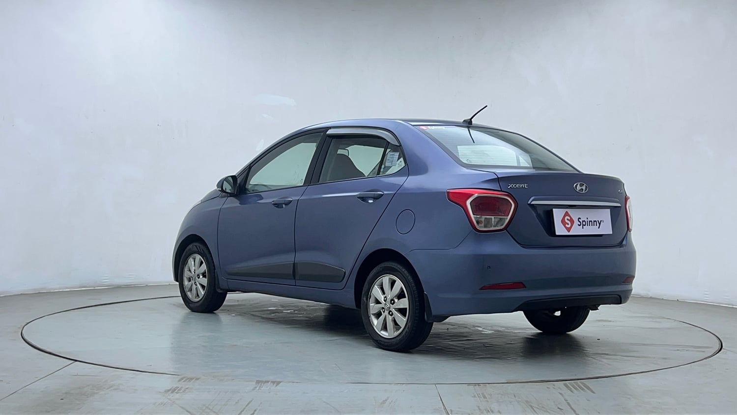 Used 2015 Hyundai Xcent SX 1.2 Petrol Manual exterior LEFT REAR CORNER VIEW