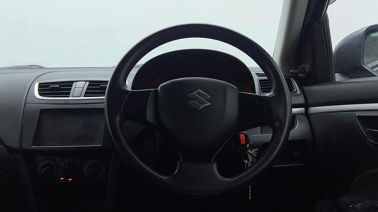 Used 2017 Maruti Suzuki Swift Lxi (O) Petrol Manual interior STEERING VIEW