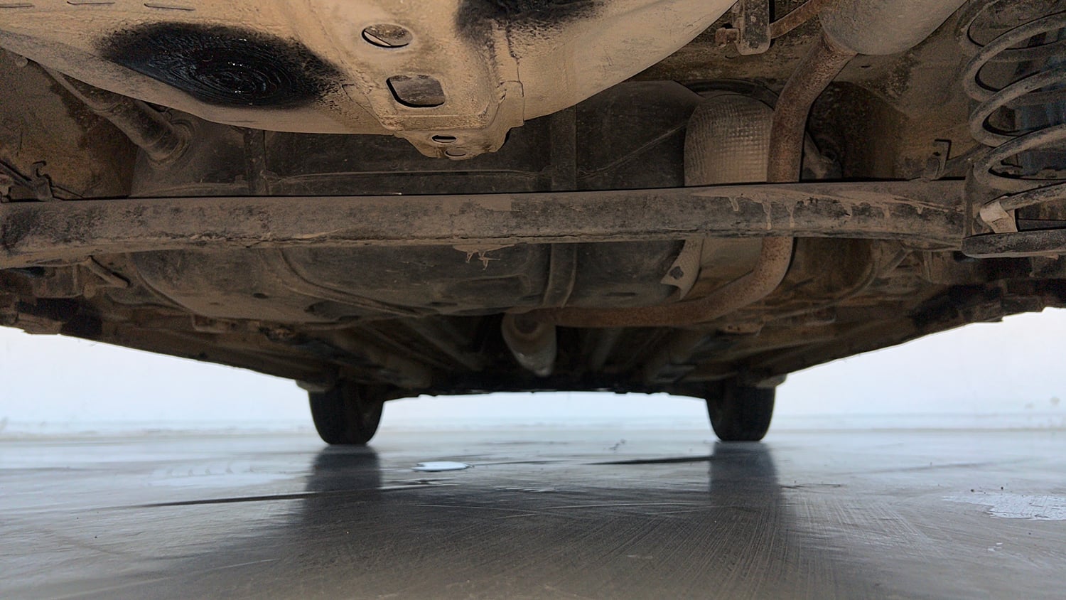Used 2017 Maruti Suzuki Swift Lxi (O) Petrol Manual extra REAR UNDERBODY VIEW (TAKEN FROM REAR)