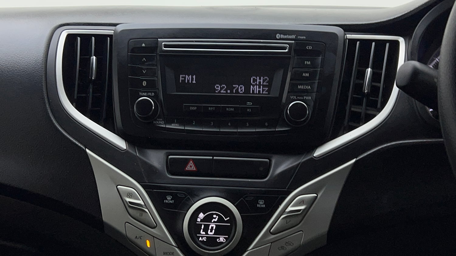 Used 2018 Maruti Suzuki Baleno Delta 1.2 Petrol Manual top_features Integrated (in-dash) music system