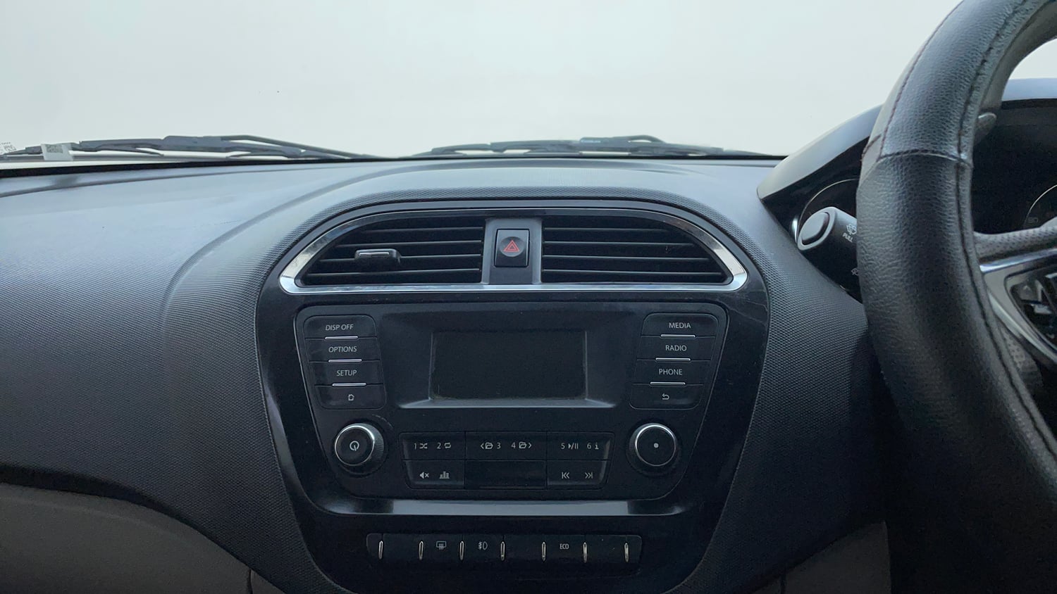 Used 2018 Tata Tiago Revotron XZ Petrol Manual top_features Integrated (in-dash) music system
