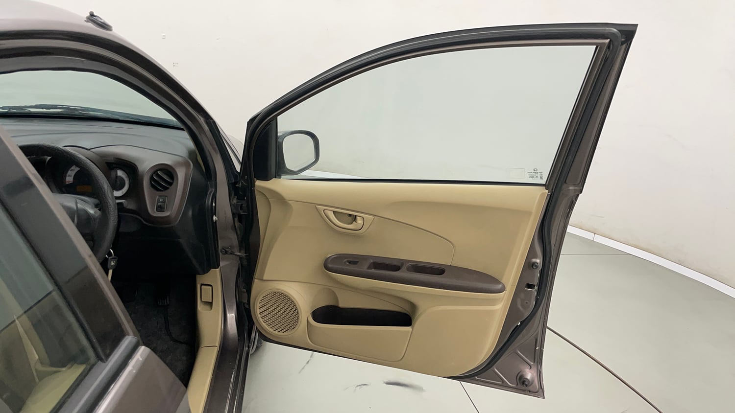 Used 2013 Honda Brio E MT Petrol Manual interior RIGHT FRONT DOOR OPEN VIEW