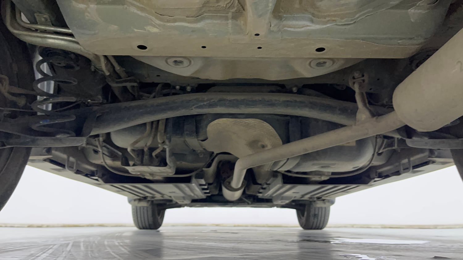 Used 2024 Maruti Suzuki Grand Vitara Sigma Smart Hybrid Petrol Manual extra REAR UNDERBODY VIEW (TAKEN FROM REAR)