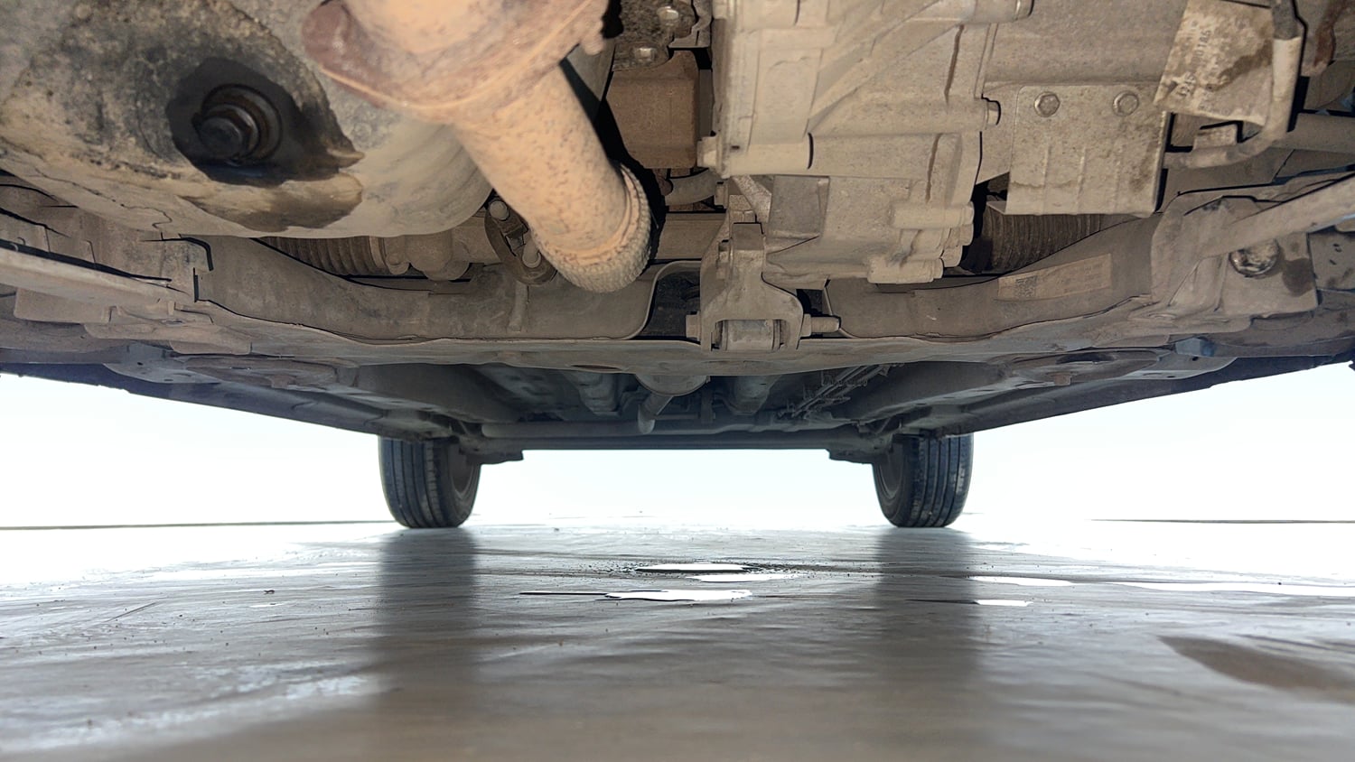Used 2022 Tata Punch Camo Accomplished Dazzle AMT Petrol Automatic extra FRONT LEFT UNDERBODY VIEW