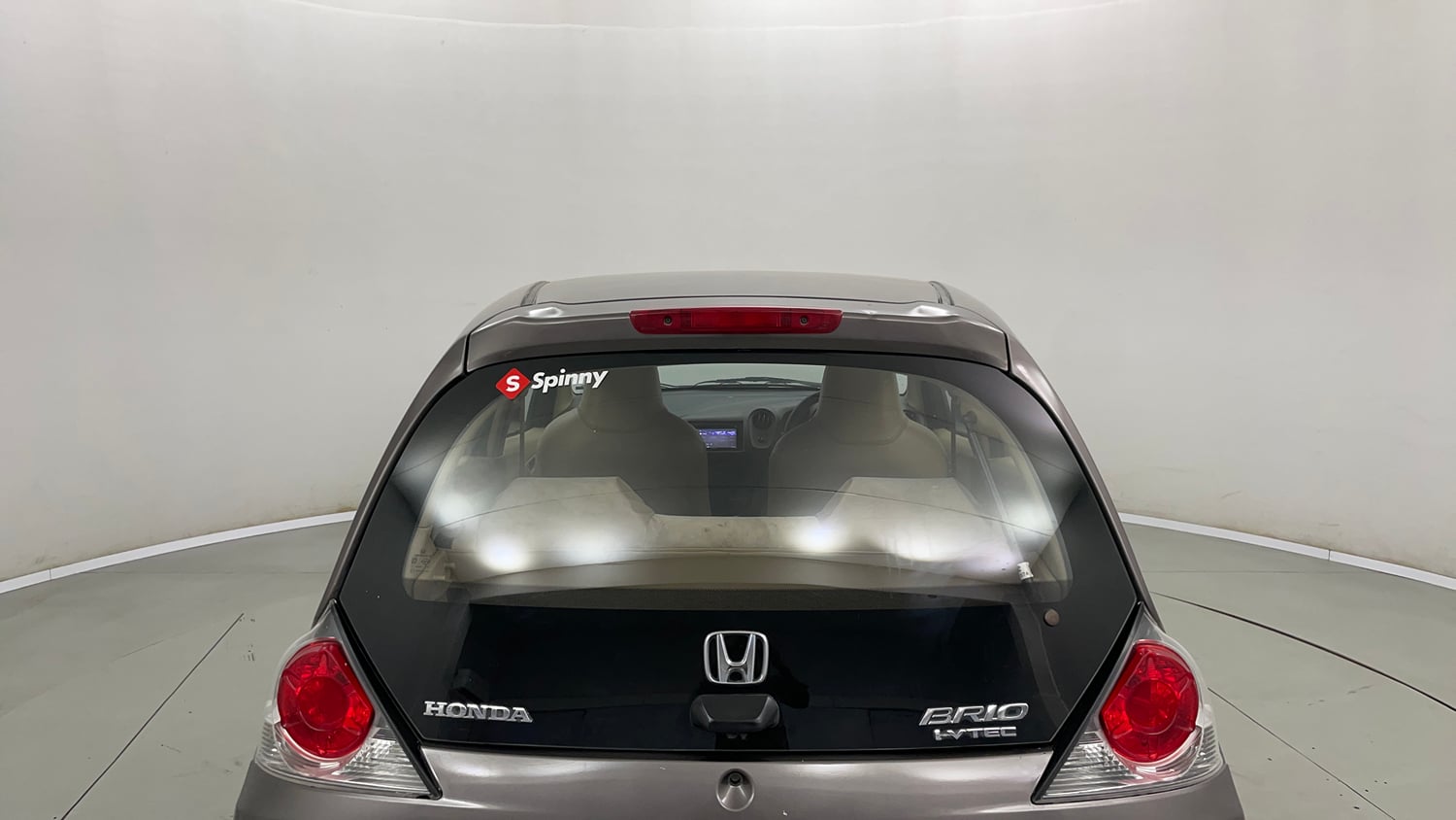 Used 2013 Honda Brio E MT Petrol Manual exterior BACK WINDSHIELD VIEW