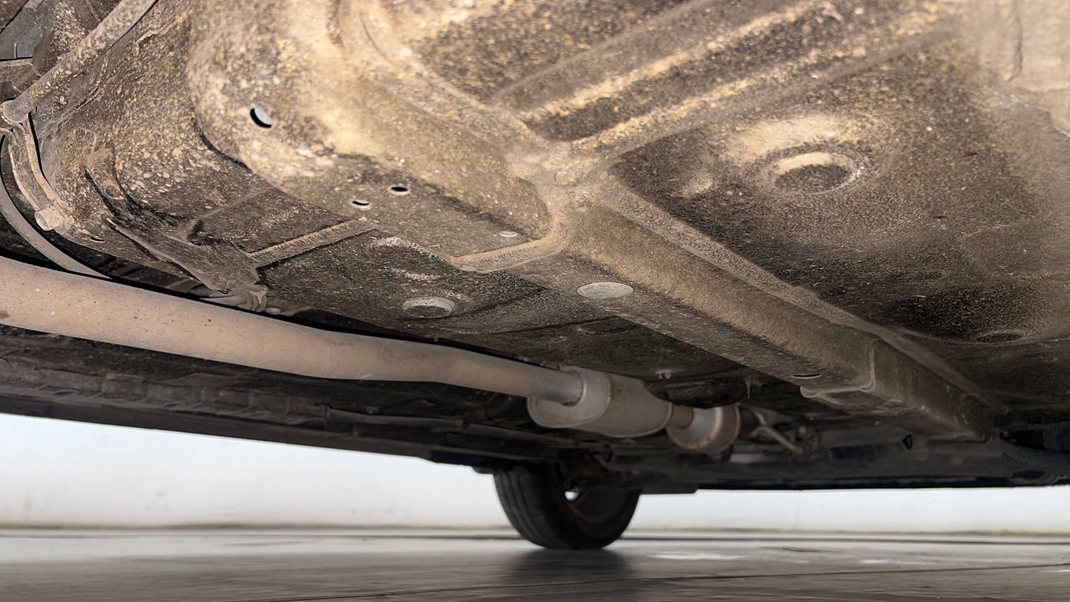 Used 2024 Hyundai Grand i10 Nios Sportz 1.2 Kappa AMT Petrol Automatic extra REAR RIGHT UNDERBODY VIEW