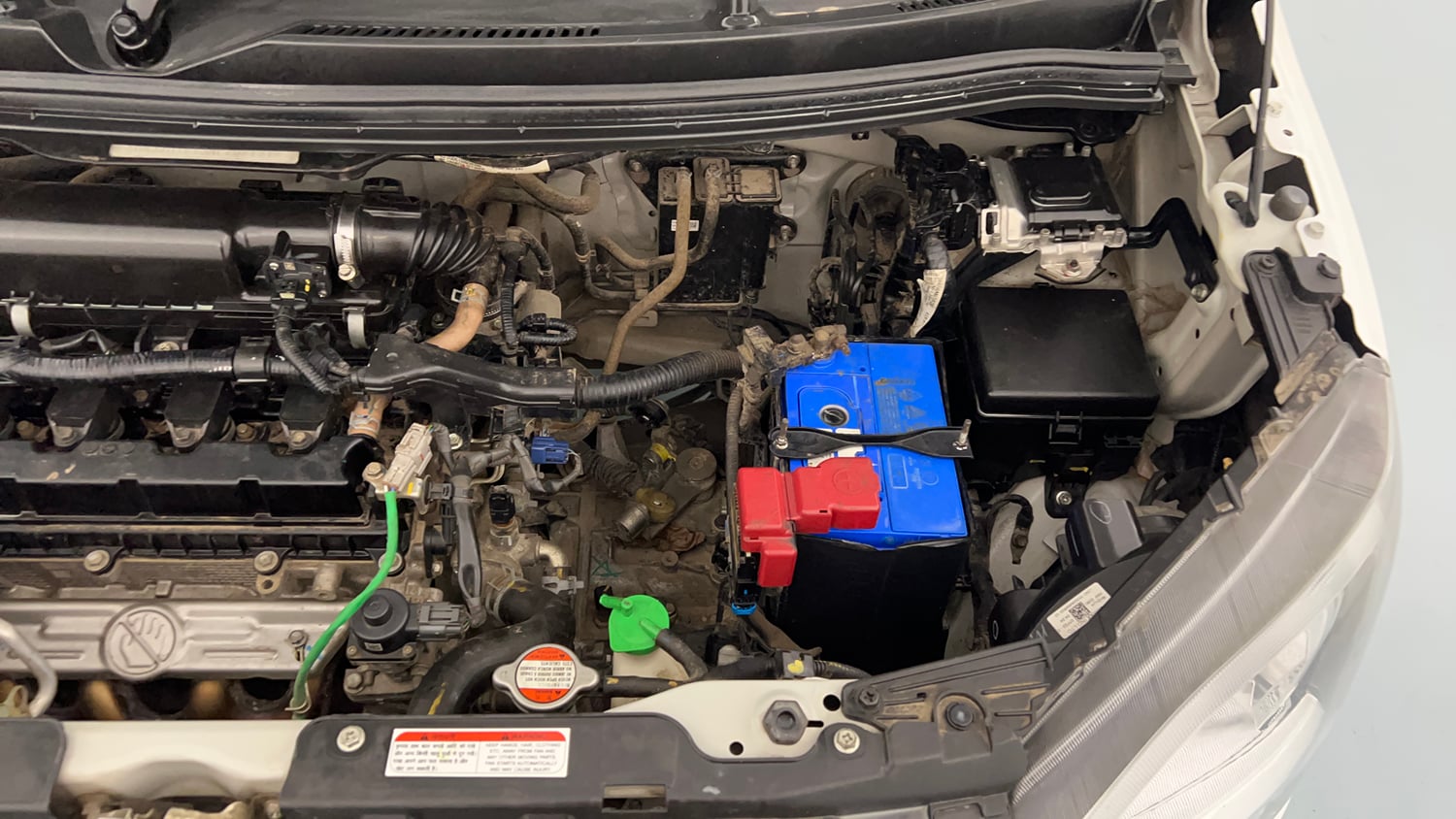 Used 2022 Maruti Suzuki Wagon R ZXI 1.2 Petrol Manual engine ENGINE LEFT SIDE VIEW