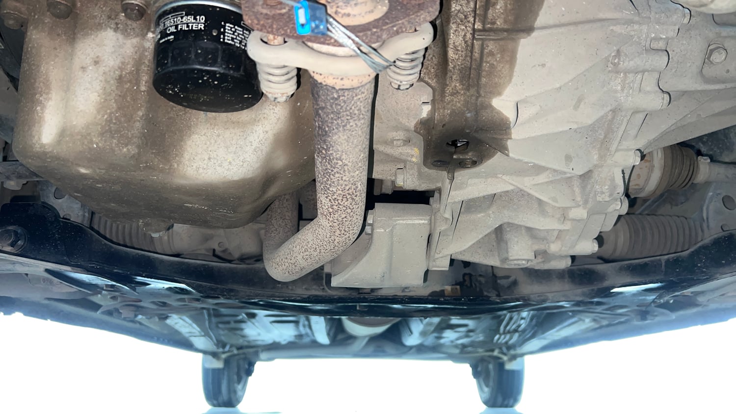 Used 2023 Maruti Suzuki Wagon R VXI 1.0 AGS Petrol Automatic extra FRONT LEFT UNDERBODY VIEW