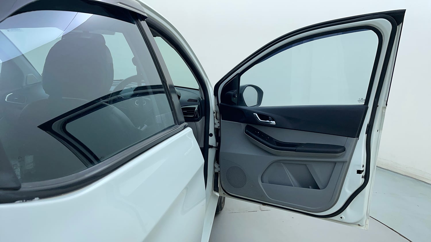 Used 2021 Tata Tiago XZ Plus Dual Tone Petrol Manual interior RIGHT FRONT DOOR OPEN VIEW