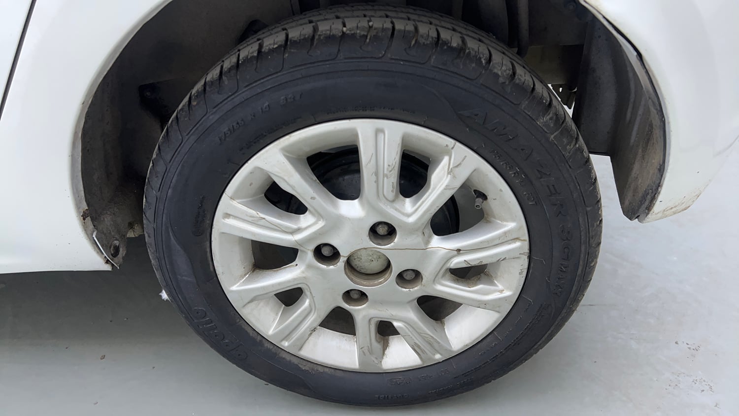 Used 2017 Tata Tiago Revotron XZ Petrol Manual tyres LEFT REAR TYRE RIM VIEW