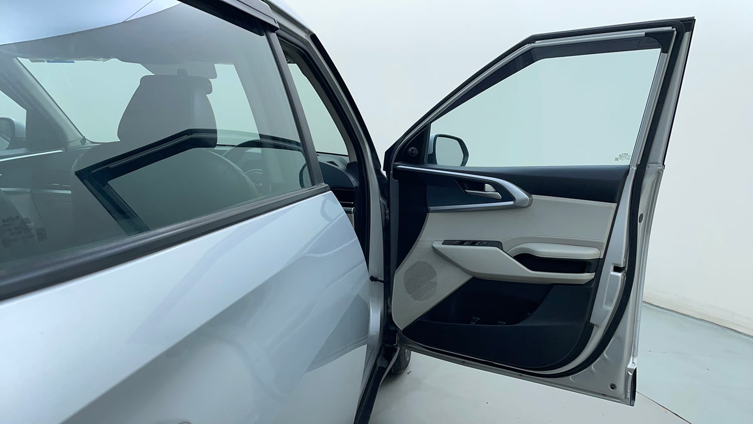 Used 2023 Kia Carens Premium 1.4 Petrol 7 STR Petrol Manual interior RIGHT FRONT DOOR OPEN VIEW