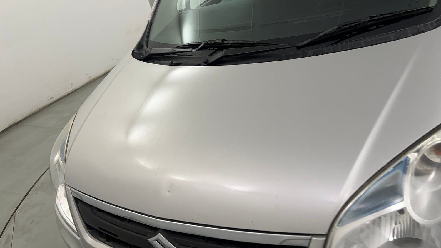 Used 2013 Maruti Suzuki Wagon R VXI Petrol Manual dents MINOR DENT
