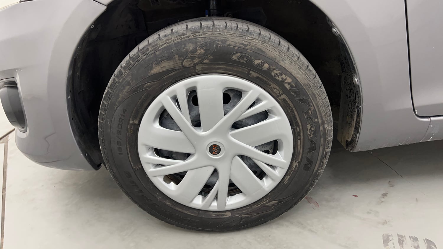 Used 2012 Maruti Suzuki Swift Dzire VXI Petrol Manual tyres LEFT FRONT TYRE RIM VIEW