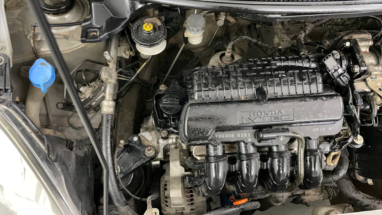 Used 2013 Honda Brio E MT Petrol Manual engine ENGINE RIGHT SIDE VIEW