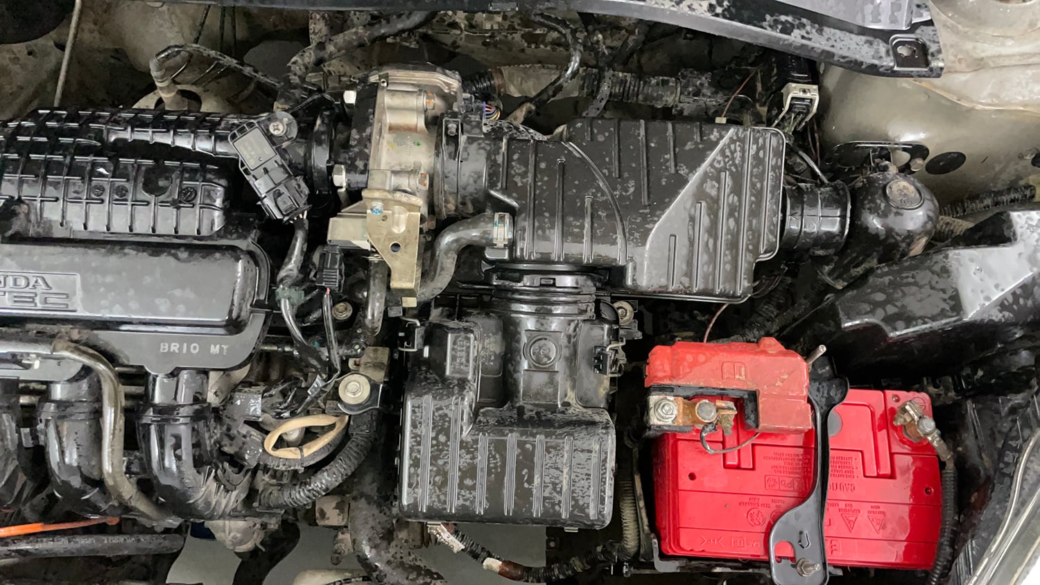 Used 2013 Honda Brio E MT Petrol Manual engine ENGINE LEFT SIDE VIEW
