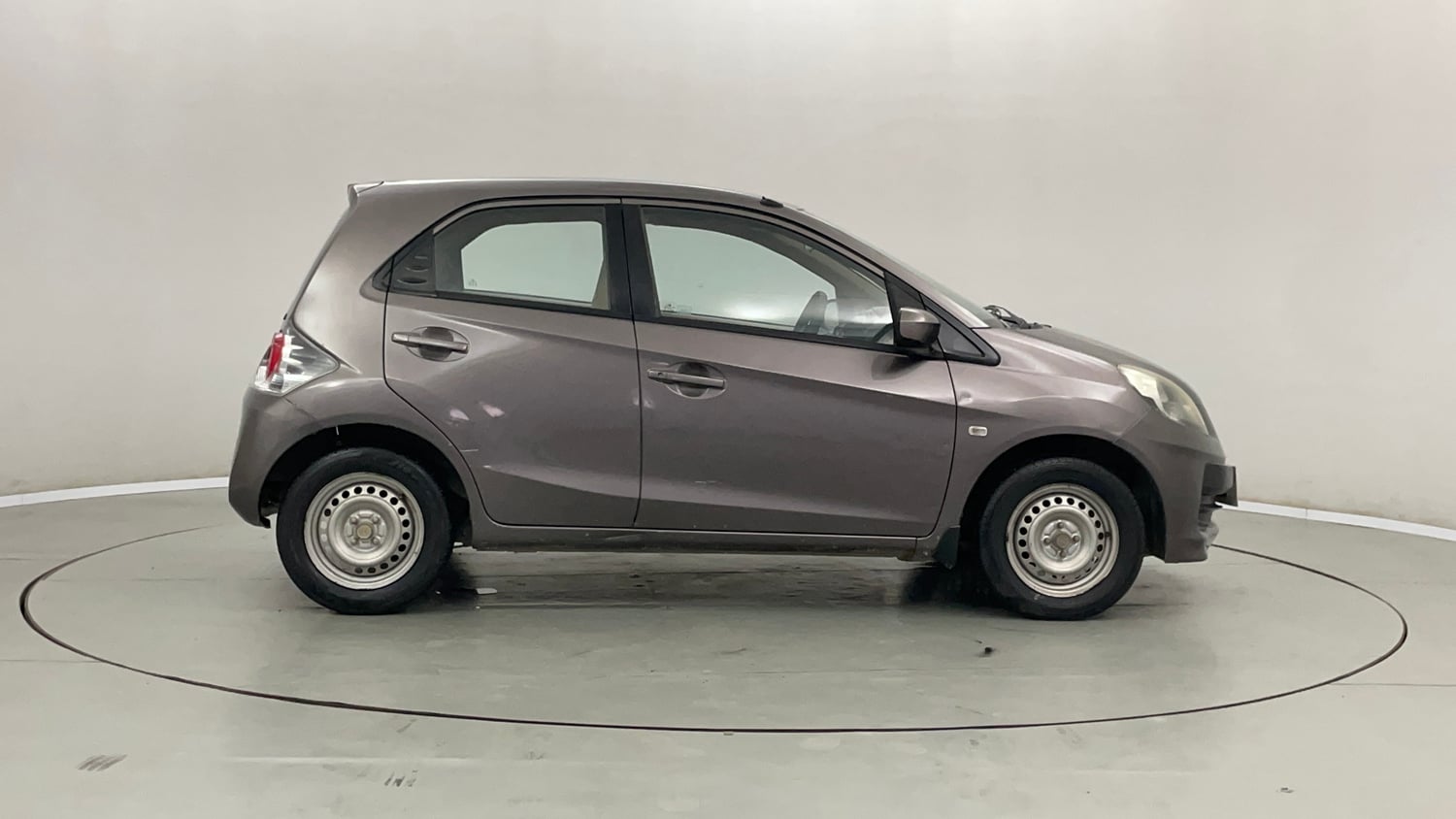 Used 2013 Honda Brio E MT Petrol Manual exterior RIGHT SIDE VIEW