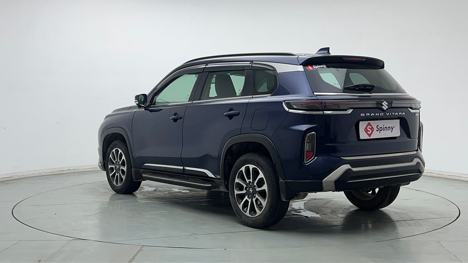 Used 2023 Maruti Suzuki Grand Vitara Alpha Smart Hybrid AT Petrol Automatic exterior LEFT REAR CORNER VIEW