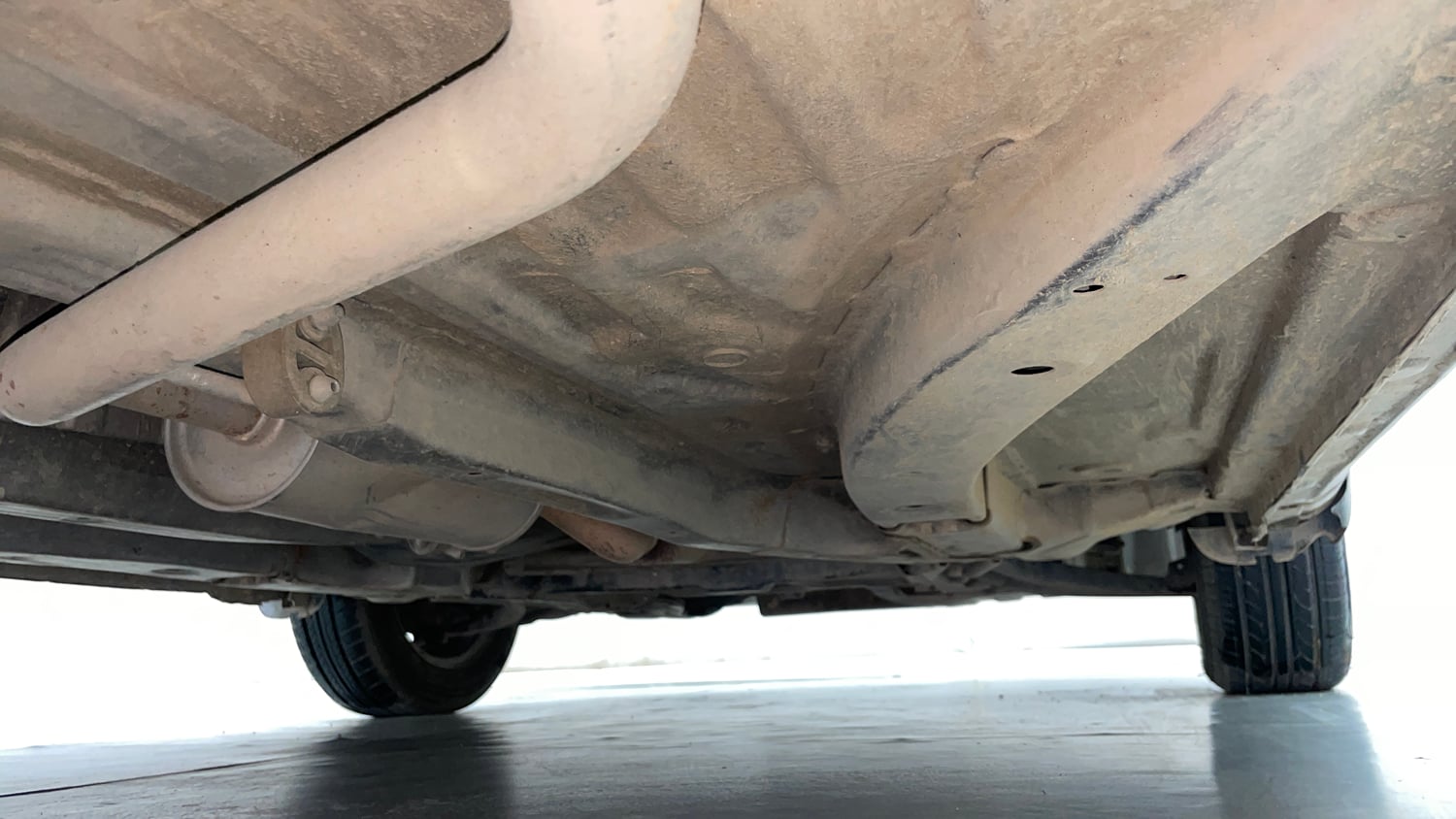 Used 2013 Honda Brio E MT Petrol Manual extra REAR RIGHT UNDERBODY VIEW