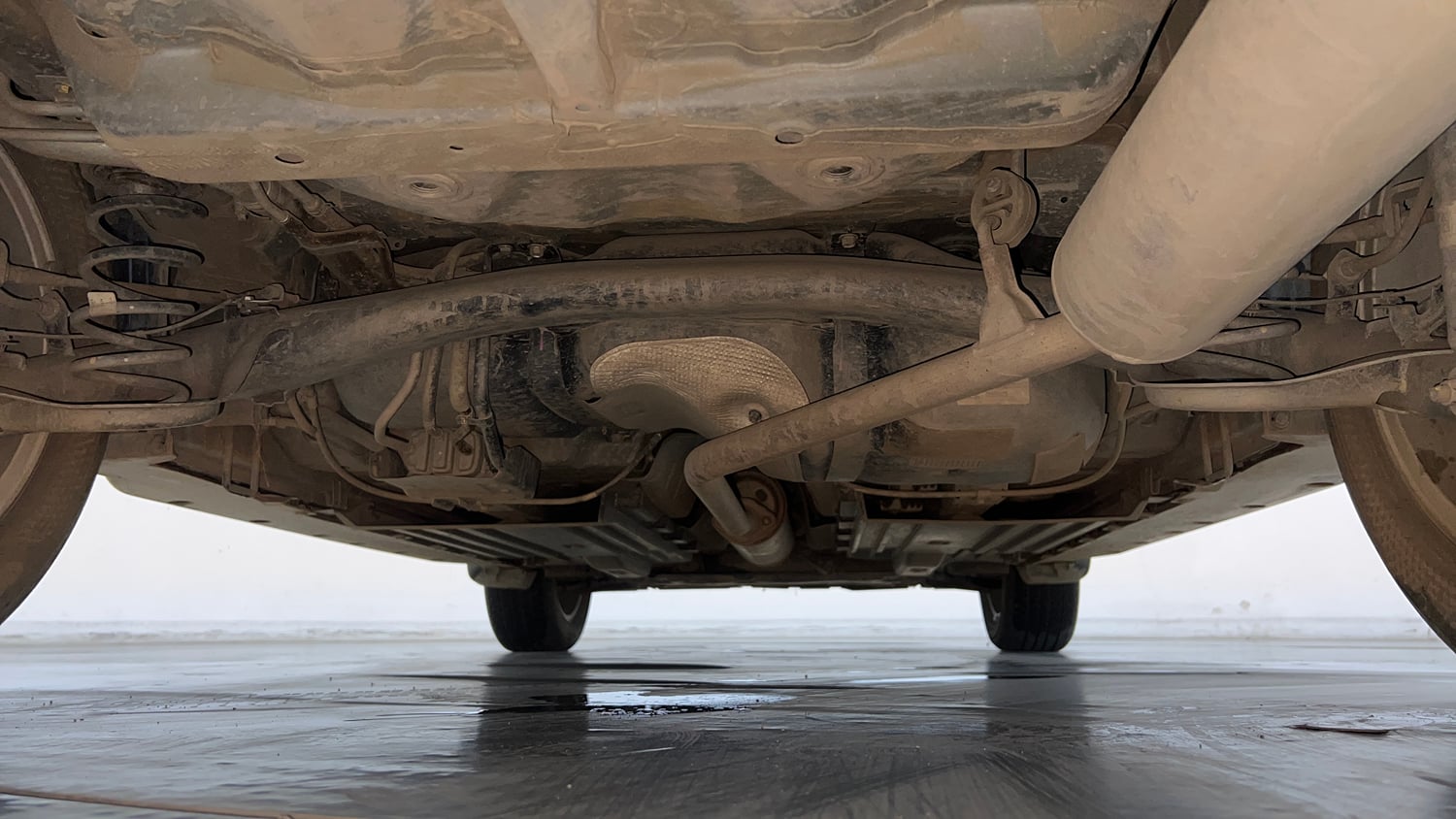 Used 2023 Maruti Suzuki Grand Vitara Alpha Smart Hybrid AT Petrol Automatic extra REAR UNDERBODY VIEW (TAKEN FROM REAR)