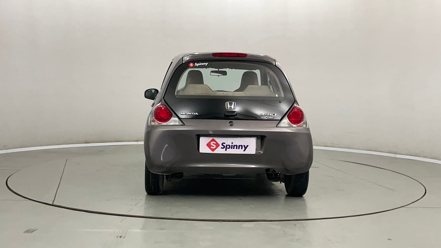 Used 2013 Honda Brio E MT Petrol Manual exterior BACK VIEW