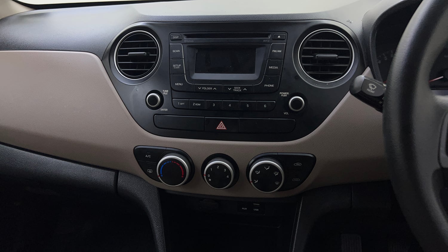 Used 2016 Hyundai Grand i10 Sportz 1.2 Kappa VTVT Petrol Manual top_features Integrated (in-dash) music system