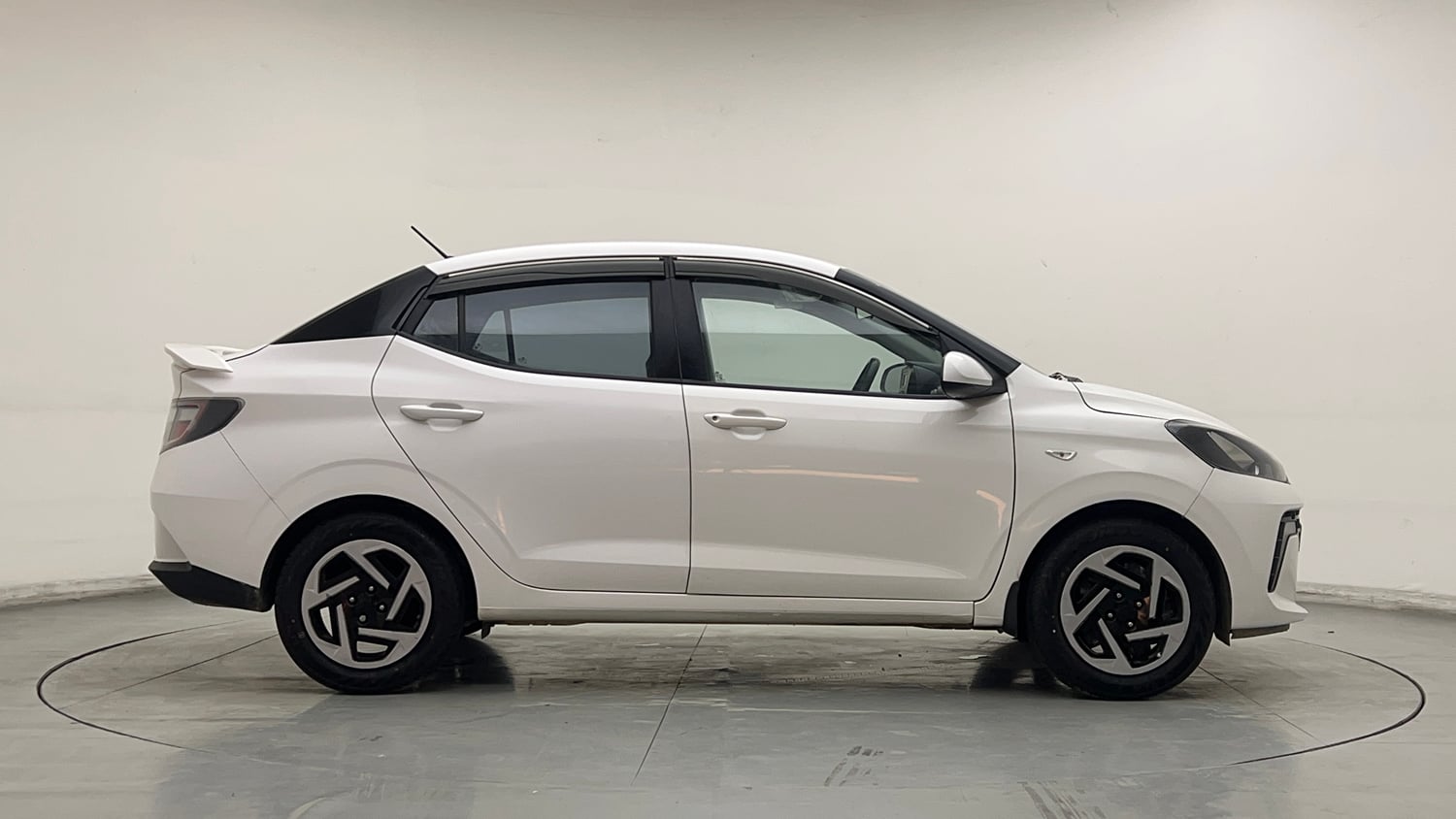 Used 2023 Hyundai Aura S 1.2 CNG Cng Manual exterior RIGHT SIDE VIEW