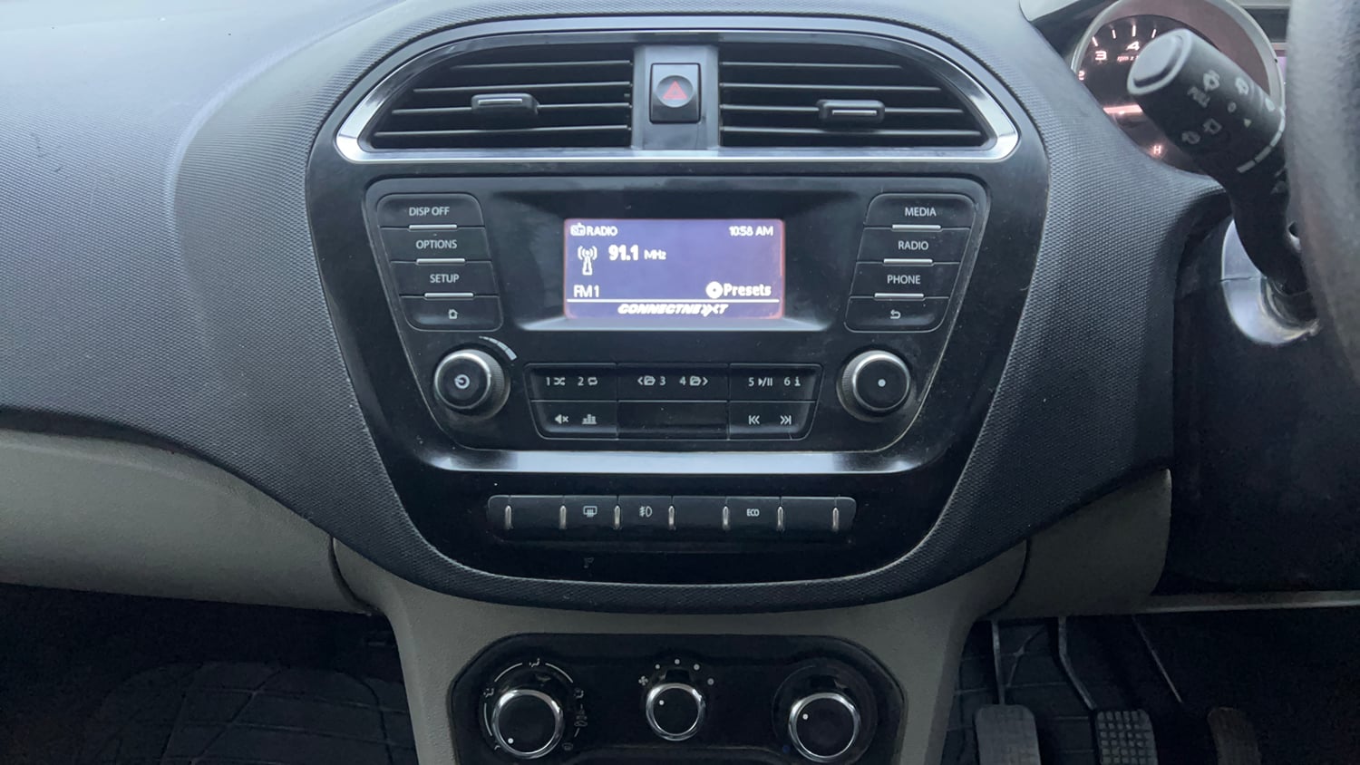 Used 2017 Tata Tiago Revotron XZ Petrol Manual interior MUSIC SYSTEM & AC CONTROL VIEW