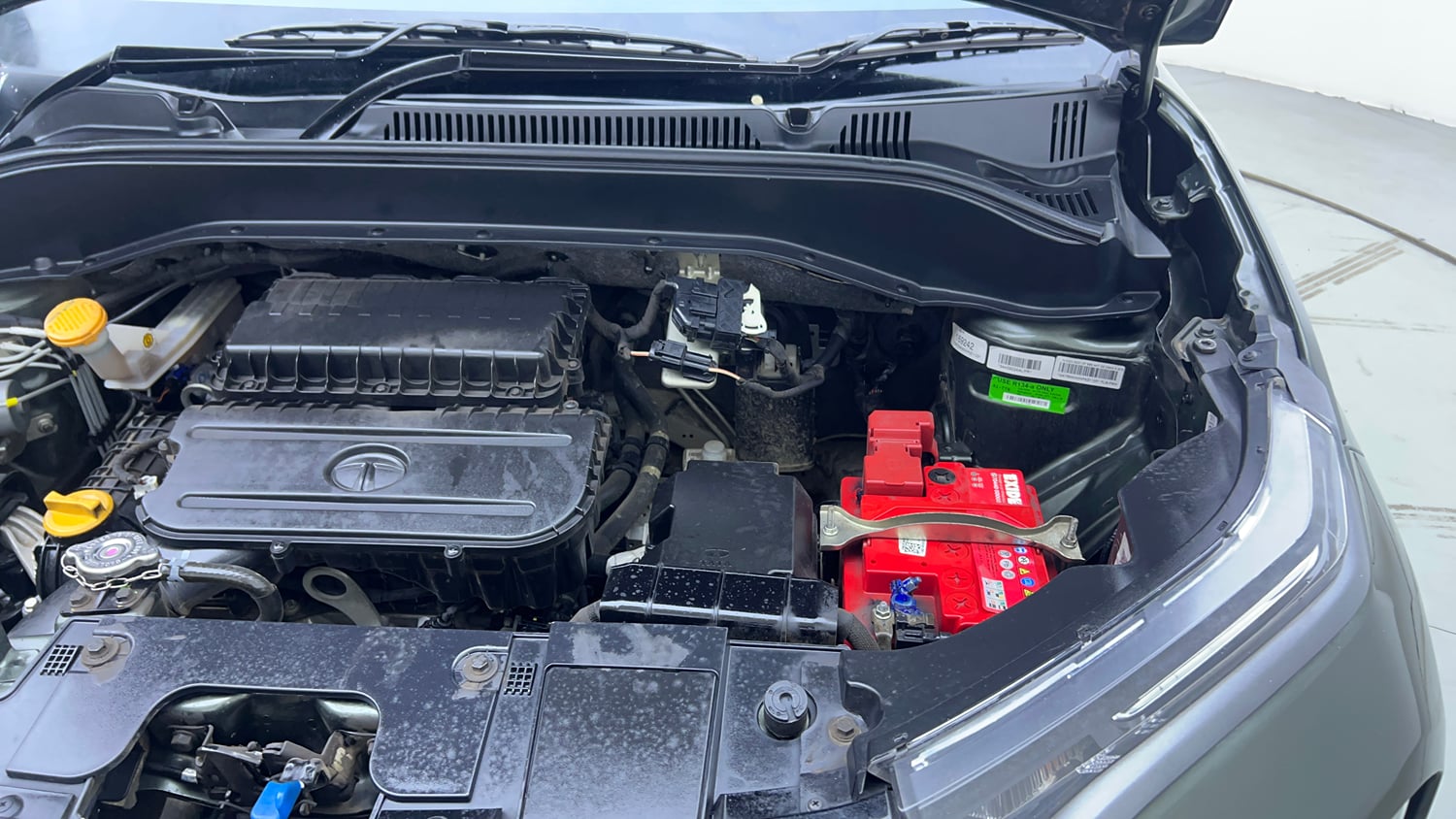 Used 2022 Tata Punch Camo Accomplished Dazzle AMT Petrol Automatic engine ENGINE LEFT SIDE VIEW