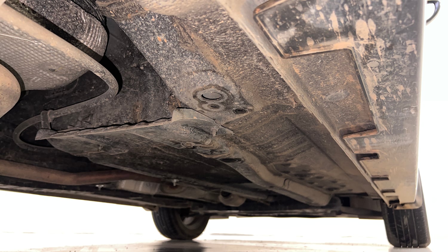Used 2024 Hyundai New i20 Asta (O) 1.2 MT Petrol Manual extra REAR RIGHT UNDERBODY VIEW