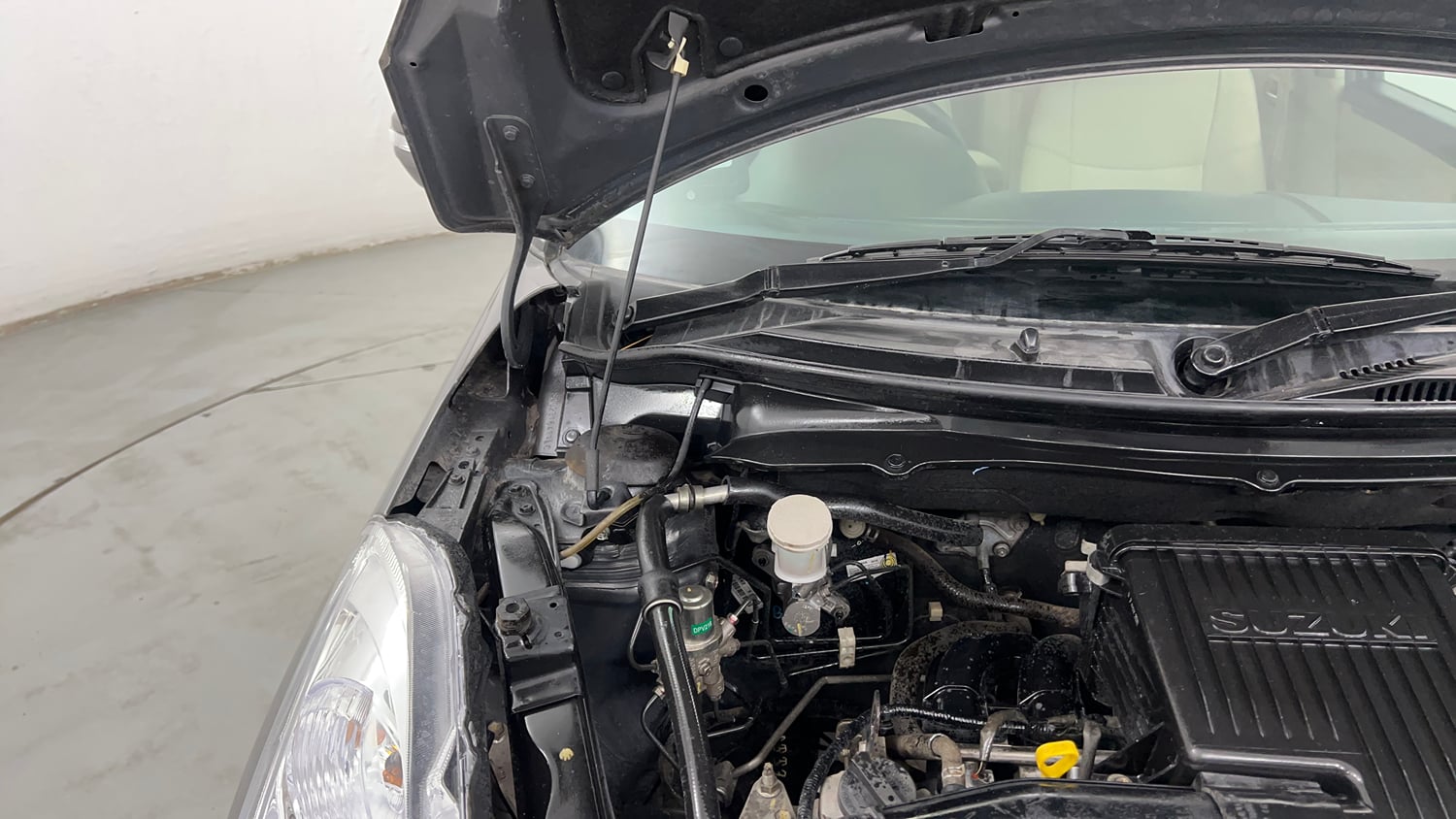 Used 2012 Maruti Suzuki Swift Dzire VXI Petrol Manual engine ENGINE RIGHT SIDE HINGE & APRON VIEW