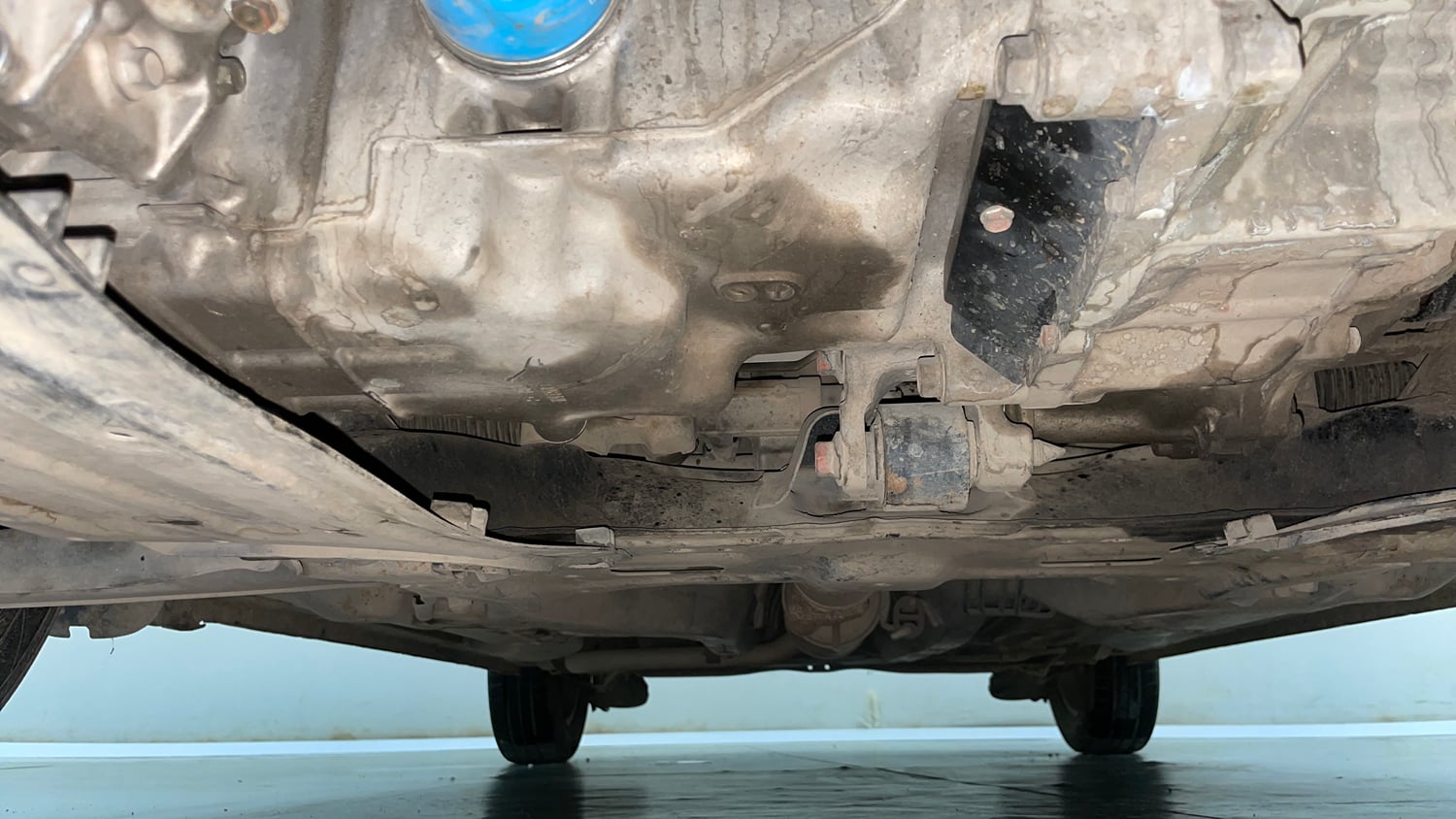 Used 2013 Honda Brio E MT Petrol Manual extra FRONT LEFT UNDERBODY VIEW