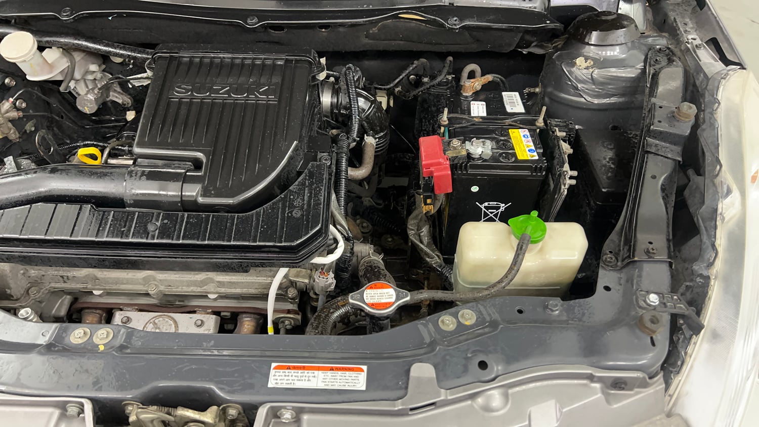 Used 2012 Maruti Suzuki Swift Dzire VXI Petrol Manual engine ENGINE LEFT SIDE VIEW