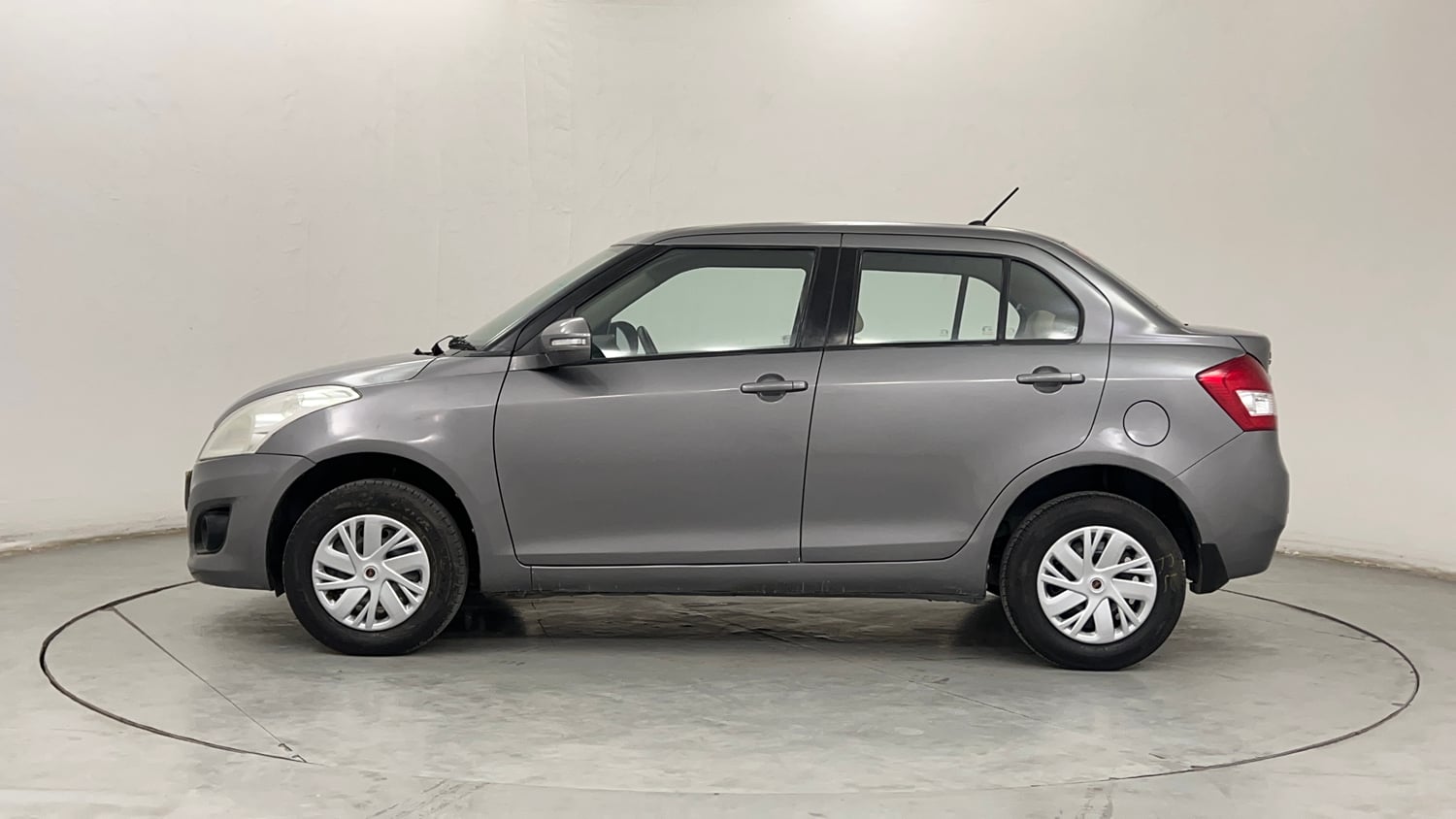 Used 2012 Maruti Suzuki Swift Dzire VXI Petrol Manual exterior LEFT SIDE VIEW
