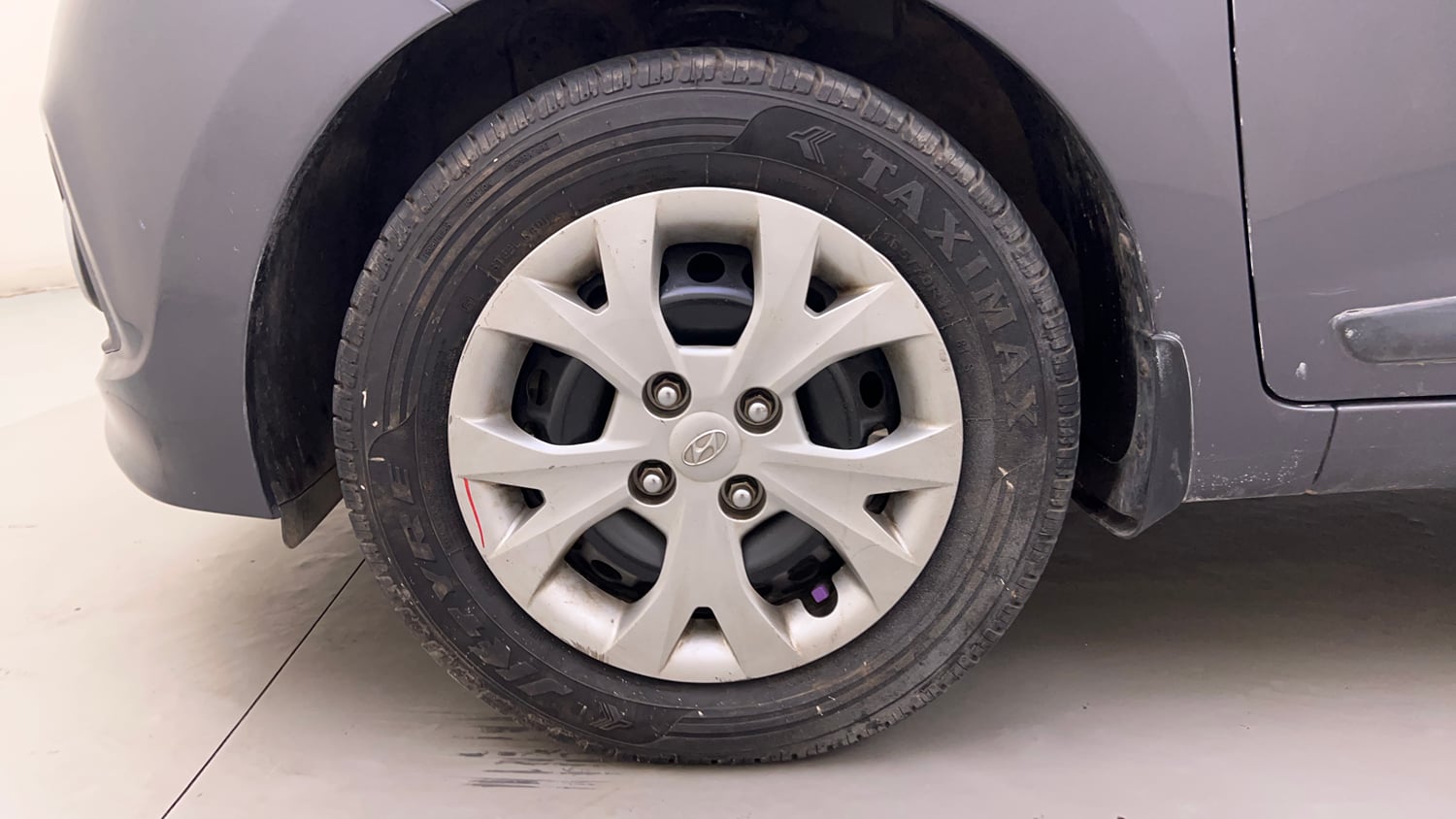 Used 2016 Hyundai Grand i10 Sportz 1.2 Kappa VTVT Petrol Manual tyres LEFT FRONT TYRE RIM VIEW