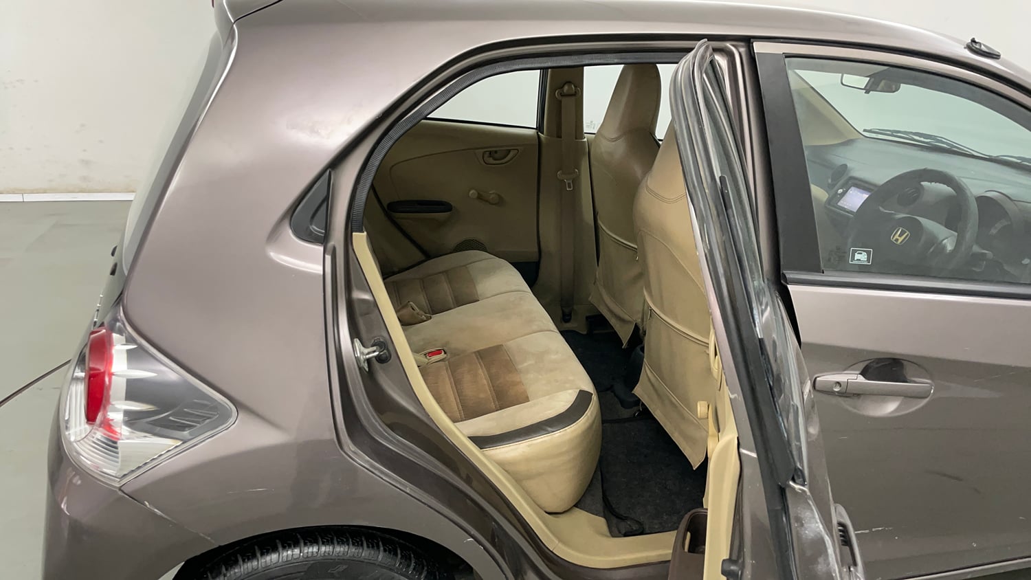 Used 2013 Honda Brio E MT Petrol Manual interior RIGHT SIDE REAR DOOR CABIN VIEW