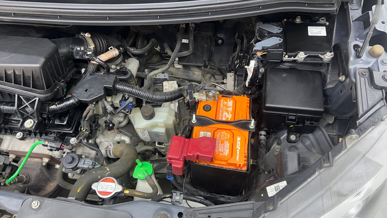 Used 2023 Maruti Suzuki Wagon R VXI 1.0 AGS Petrol Automatic engine ENGINE LEFT SIDE VIEW