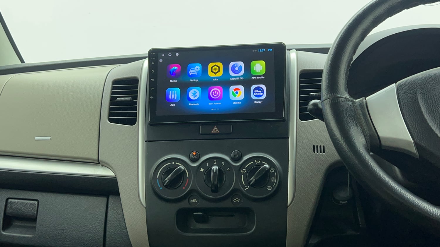 Used 2013 Maruti Suzuki Wagon R VXI Petrol Manual top_features Integrated (in-dash) music system