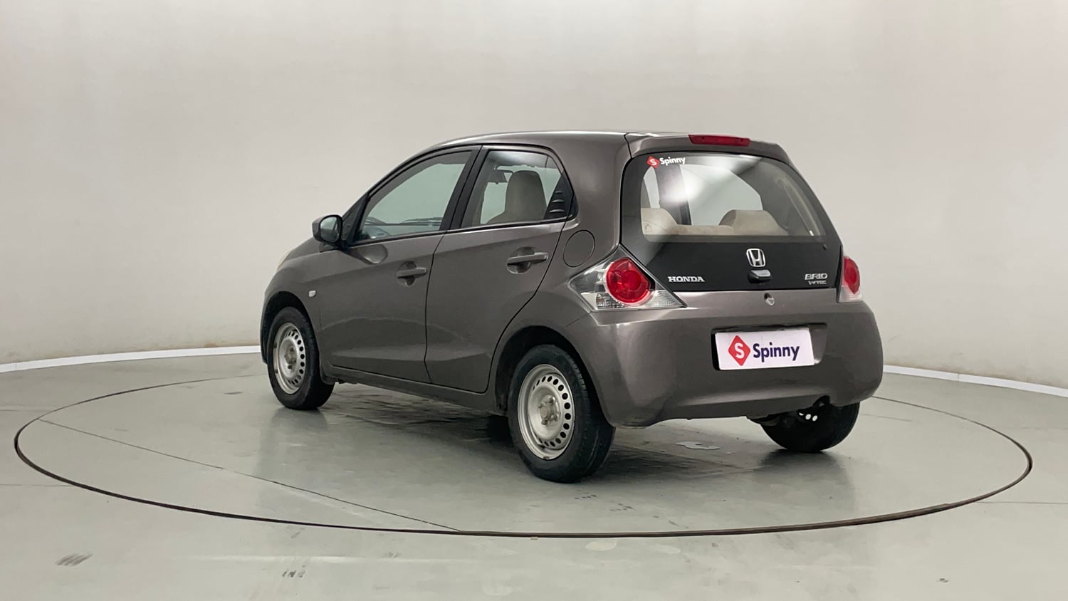Used 2013 Honda Brio E MT Petrol Manual exterior LEFT REAR CORNER VIEW