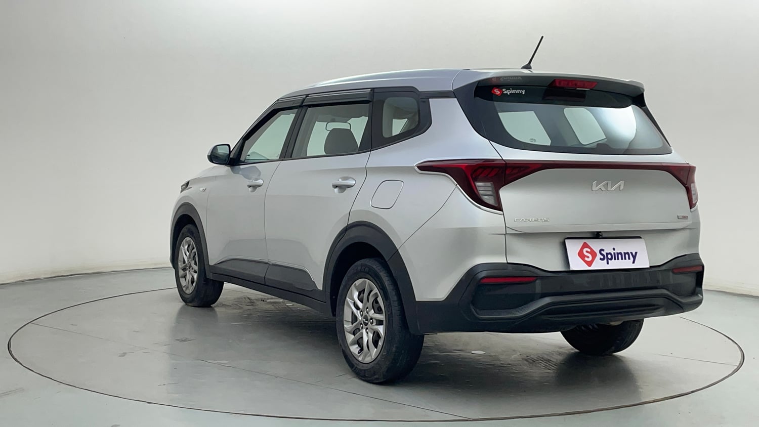 Used 2023 Kia Carens Premium 1.4 Petrol 7 STR Petrol Manual exterior LEFT REAR CORNER VIEW