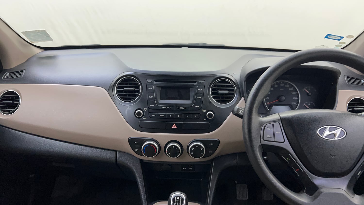 Used 2016 Hyundai Grand i10 Sportz 1.2 Kappa VTVT Petrol Manual interior MUSIC SYSTEM & AC CONTROL VIEW